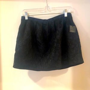 Deep blue lace mini skirt- size small.  Never worn.